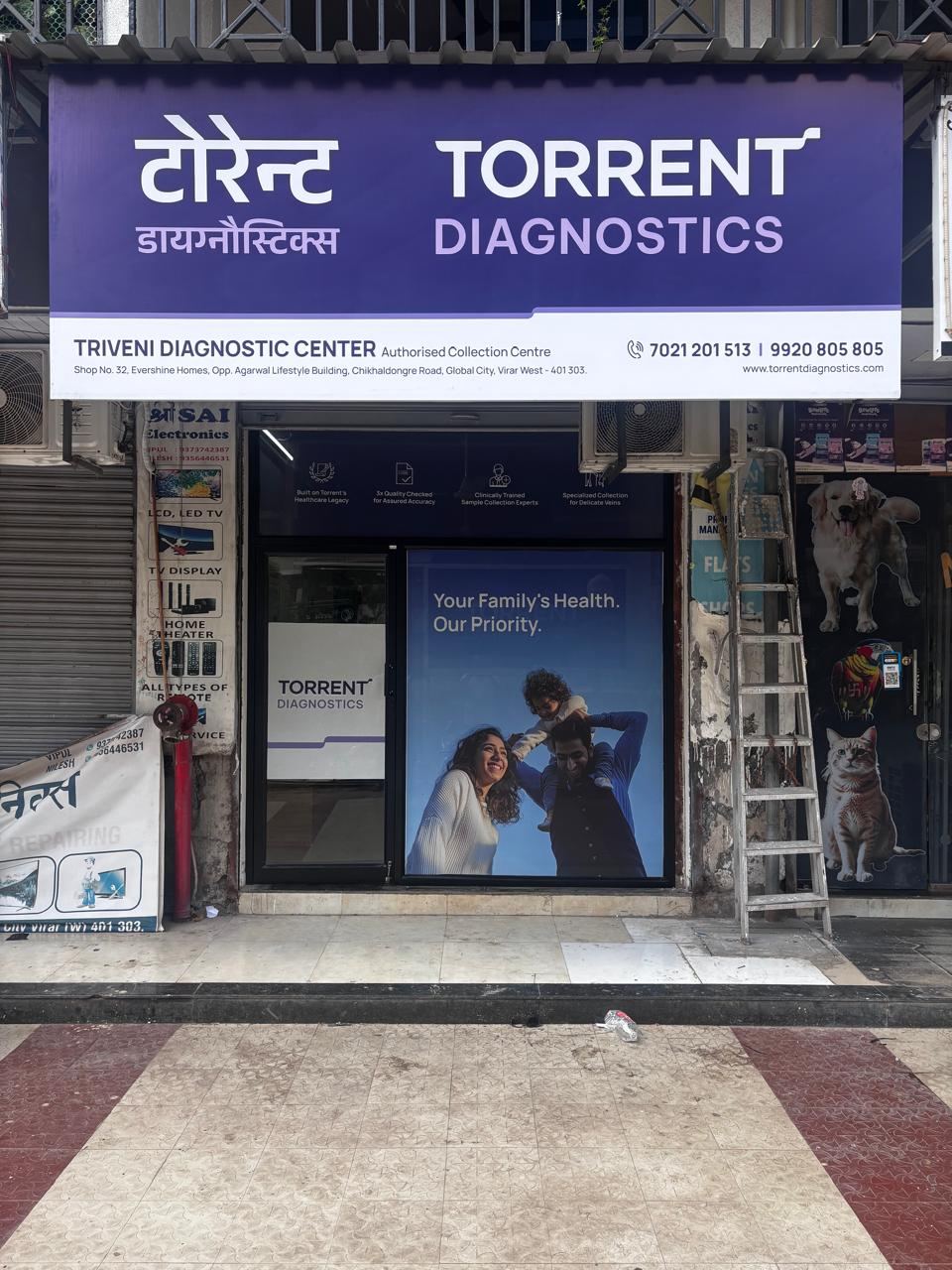 Glass shopfront signage installation in Mumbai